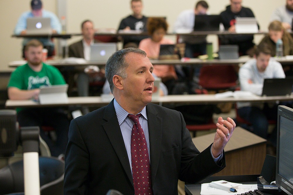 Professor and Director of the Ohio Innocence Project Mark Godsey teaching a class.